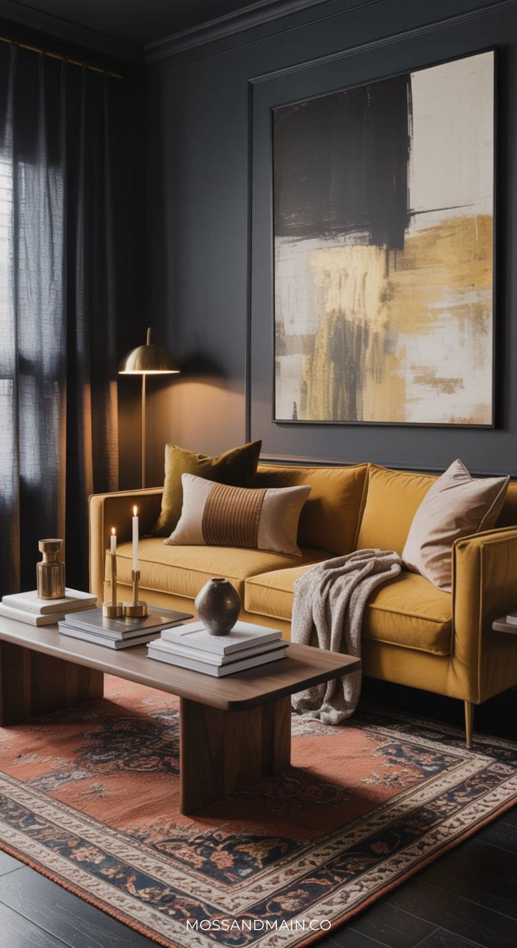 A sophisticated living room featuring a mustard sofa, neutral cushions, a wooden coffee table with candles and books, a patterned rug, abstract wall art, and warm lighting from a gold lamp—perfect for inspiring chic living room ideas.